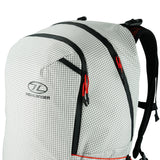 Highlander Kynetik Rucksack 25L in White - front view with twin front zips and orange bungee cords