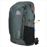 Highlander Kynetik Rucksack 20L in Black - angled front view showing the stretch side pocket and bungee cord
