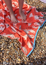Anorak Lobsters Organic Cotton Towel - Coral and pink bath mat in use