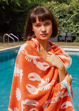 Anorak Lobsters Organic Cotton Towel - Coral and pink folded stack