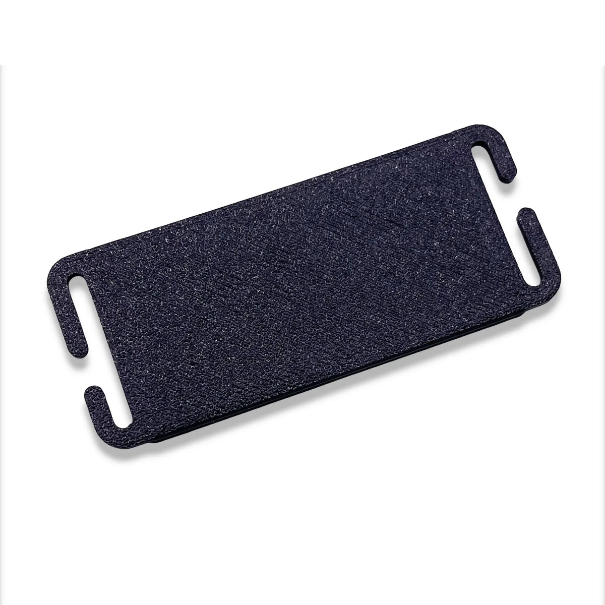 Flat back of the black mini Union Jack MOLLE patch with the two clip tabs