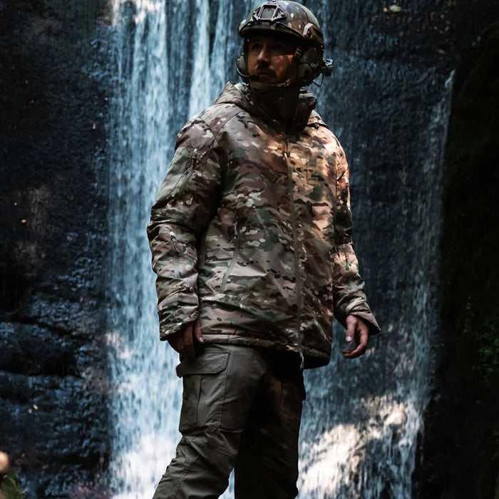 Stoirm Mission Primaloft All Weather Jacket in Multicam lifestyle stood up in the outdoors