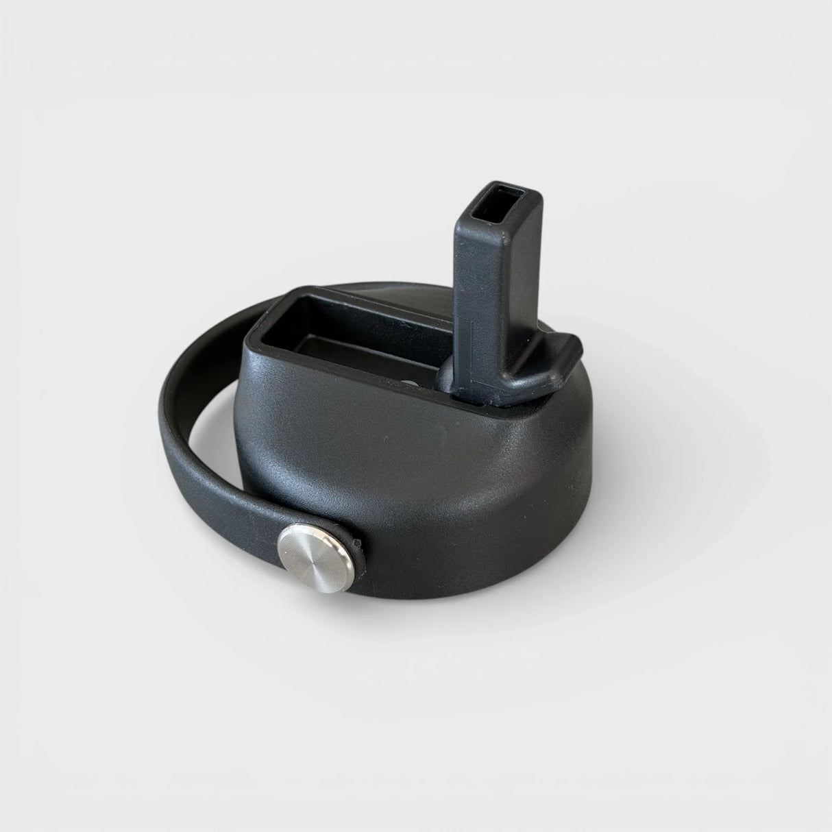 Orbie bottle sip lid open, with the rectangular spout folded up for drinking