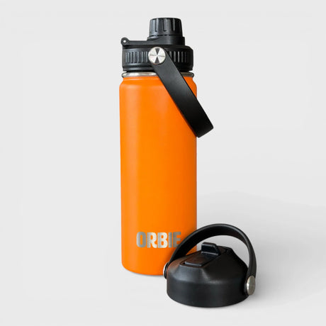 Orbie 18oz insulated water bottle in orange with the chug lid fitted and the sip lid standing alongside