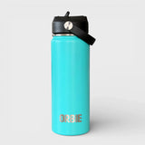 Turquoise Orbie 18oz insulated bottle with the low-profile sip lid fitted