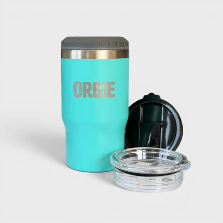 Orbie 12oz insulated cup in turquoise with the grey can cooler collar fitted, beside the flip-top and sliding sip lids