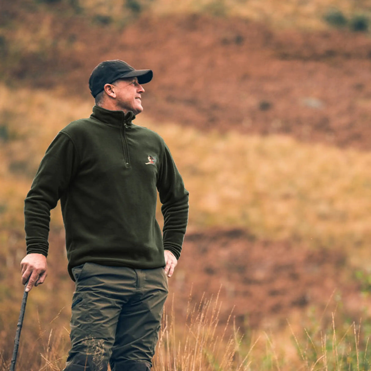 Jack Pyke Pheasant Fleece Pullover in Dark Olive from the front outdoors