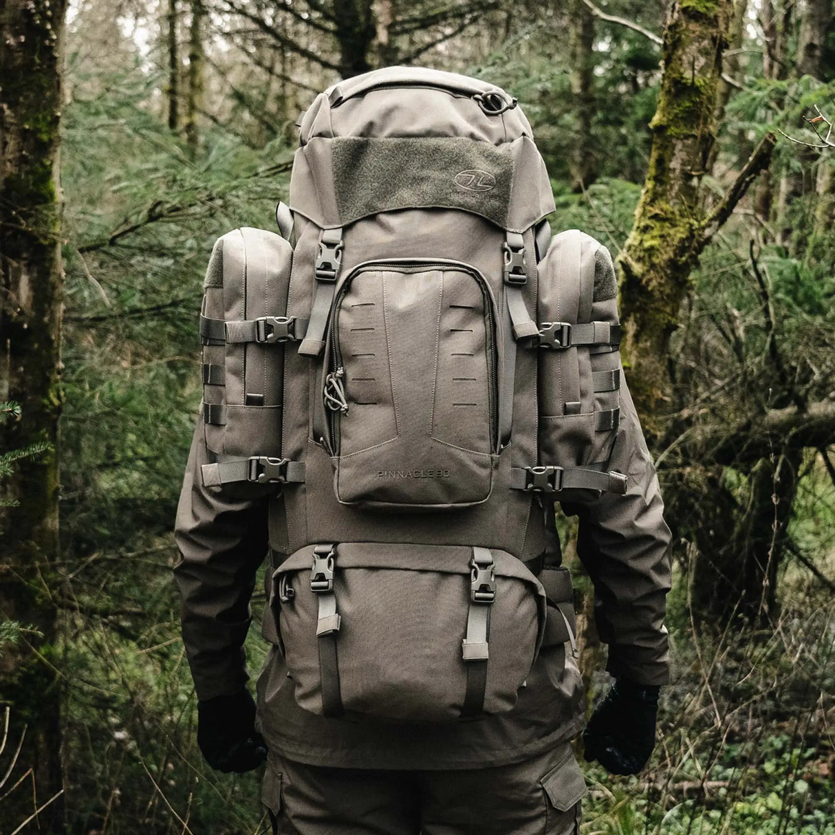 Highlander Pinnacle Rucksack 90L in ranger green in the outdoors