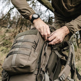 Highlander Pinnacle Rucksack 90L in ranger green in the outdoors