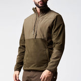 Jack Pyke Rannock Fleece Pullover in dark olive worn by a model, three-quarter view with the 1/4 zip undone and the collar open