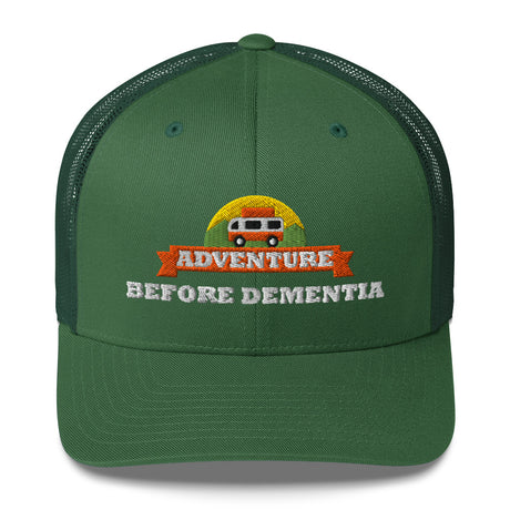 Adventure Before Dementia Trucker Cap in Evergreen, front view of the embroidered badge