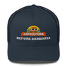 Adventure Before Dementia Trucker Cap in Navy, front view of the embroidered badge
