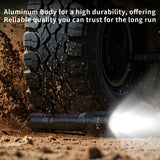 Skywoods OZL1800 Zoomable Torch Light - aluminium body shown in dusty off-road conditions
