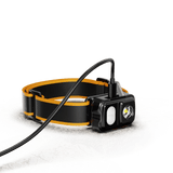 Skywoods OHL550 Headlamp - lamp lit with the charging cable attached