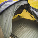 Snugpak Stratosphere WGTE Bivvi Shelter in Olive Green - interior through the open entrance with a self-inflating mat and yellow inner