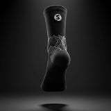 Stride North East Trail Running Socks in Black from the back on black background