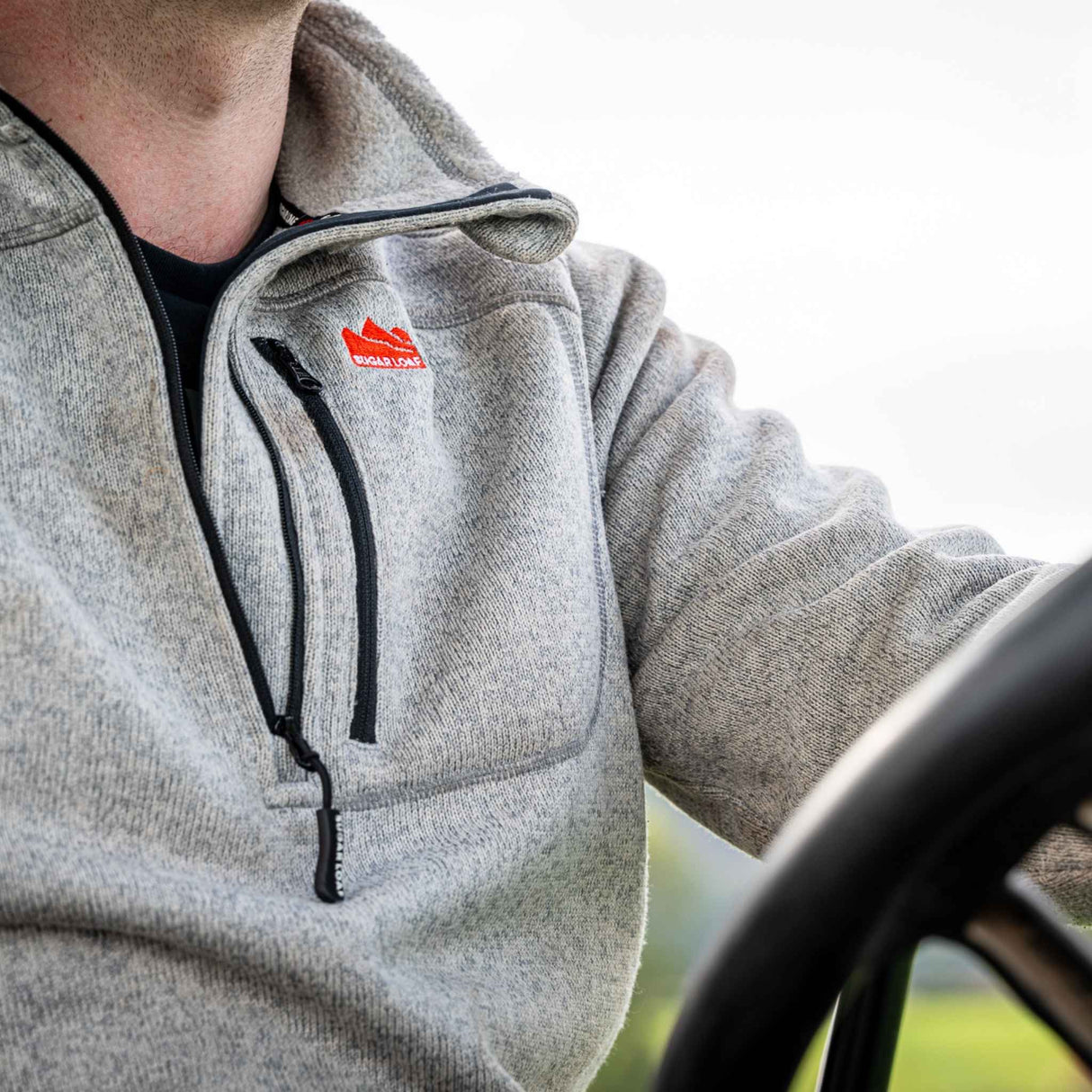 Sugar Loaf Fell Half Zip Fleece Top in Ash Grey close up of chest pocket