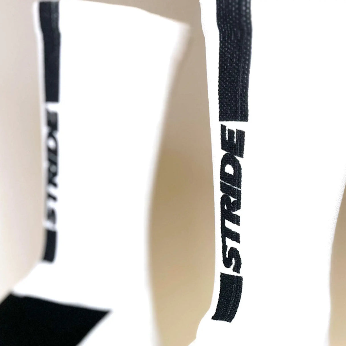 Stride North East "The Daily Stride" Performance Running Socks close up the branding