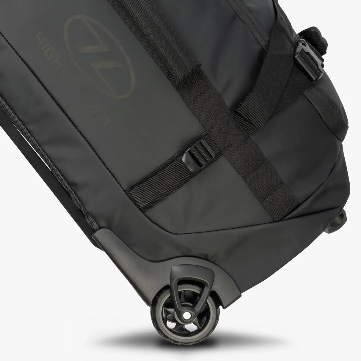 Highlander The Trailer Duffle with Wheels 100L - Black - side view of the wheels on white background