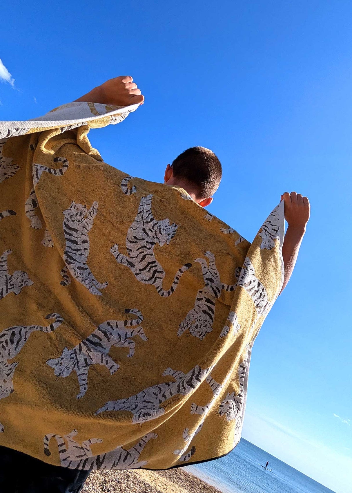 Anorak Tigers Organic Cotton Towel - Ochre and black full towel held up