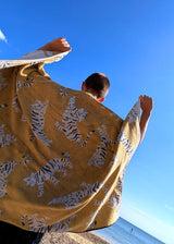 Anorak Tigers Organic Cotton Towel - Ochre and black full towel held up