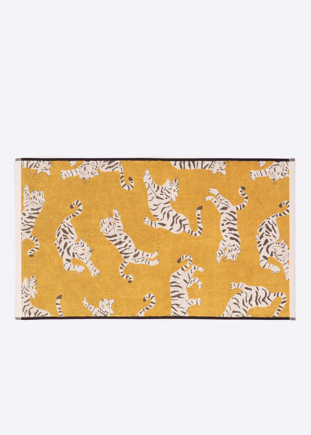 Anorak Tigers Organic Cotton Towel - Ochre and black bath mat flat lay