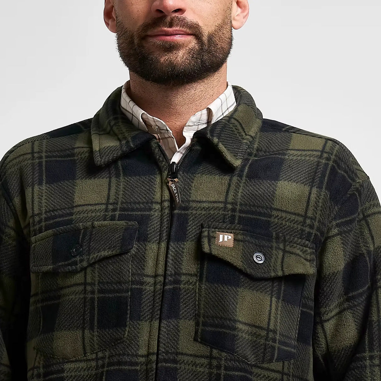 Jack Pyke Tundra Shirt in green check close up of collar and full zip