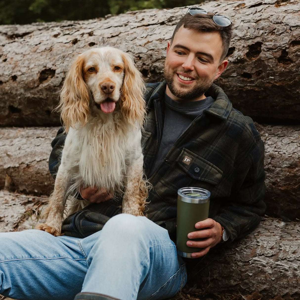 Jack Pyke Tundra Shirt in green on a man outdoors with a dog