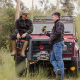 Jack Pyke Tundra Shirt in green and brown on men outdoors posing on a 4x4 car