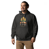Adventure Before Dementia Camping Hoodie in Charcoal Heather, worn by a model, angled front view