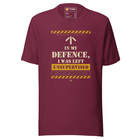 Task "In My Defence, I Was Left Unsupervised" T-shirt in Maroon, front view with stencil slogan print