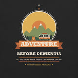 Adventure Before Dementia Campervan T-Shirt in Vintage Black, close-up of the front print: campervan, campfire and mountains inside a compass badge