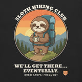 Close-up of the Sloth Hiking Club: Hilltop Hoodie back print: a sloth with a brew and a blue rucksack on a hilltop at sunset