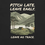 Close-up of the Pitch Late Leave Early T-Shirt print: a tent by a tarn below a craggy fell, with Scots pines, a drystone wall and the line Leave no trace