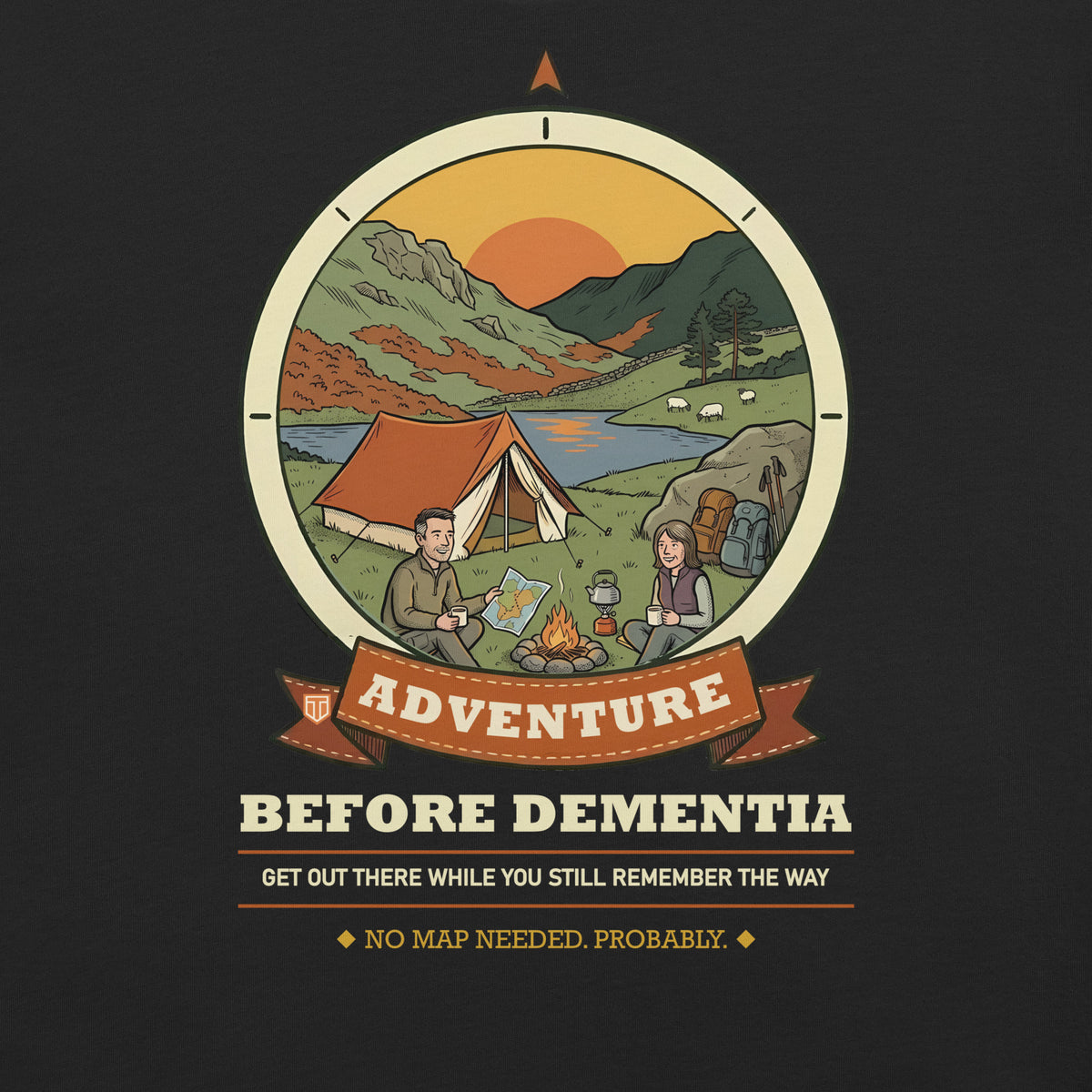 Close-up of the Adventure Before Dementia Camping T-Shirt print in Vintage Black: a couple by a campfire next to an orange tent beside a lake, with sheep, hills and a low sun inside a compass badge