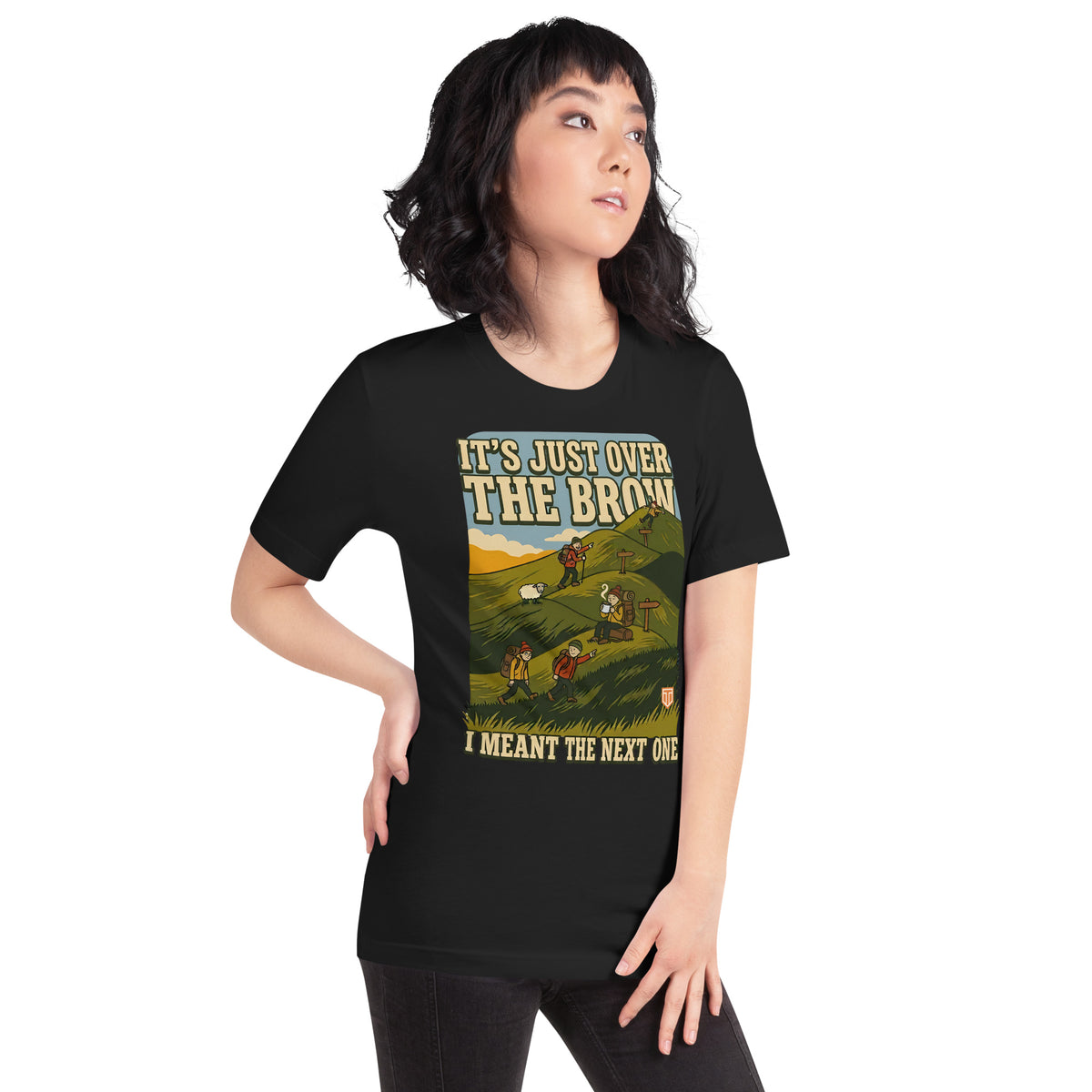 Woman with her hand on her hip wearing the It's Just Over the Brow T-Shirt in Vintage Black