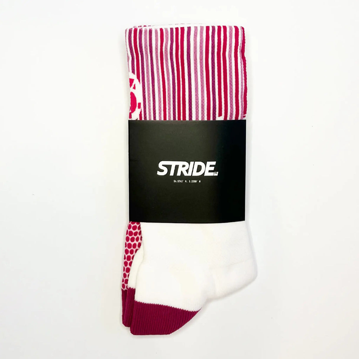 Stride North East Performance Running Socks in Violet Velocity in packaging