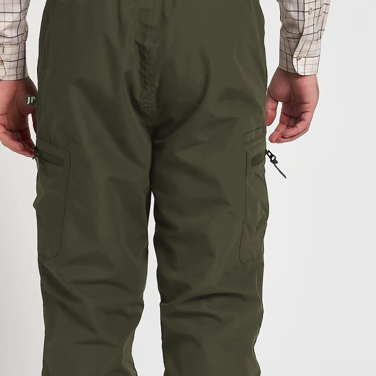 Jack Pyke Weardale Waterproof Trousers in green from the back on white background